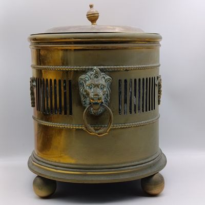 Antique brass coal bucket with lion head handles