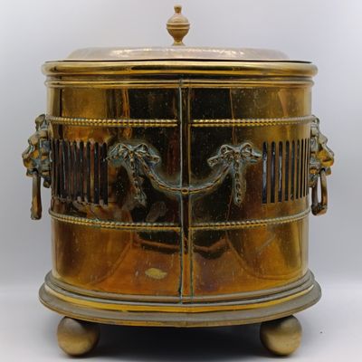 Antique brass coal bucket with lion head handles