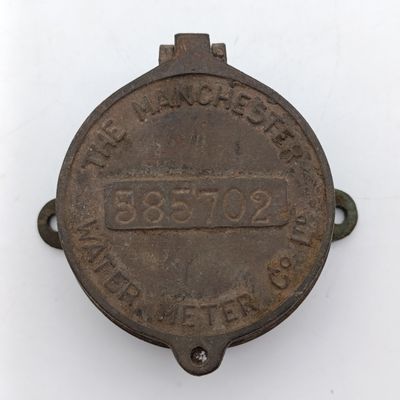 The Manchester water meter cover brass - vintage