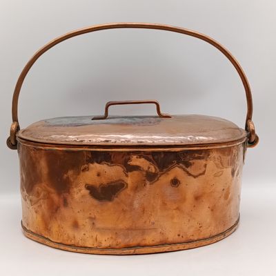 Antique oval copper casserole with lid