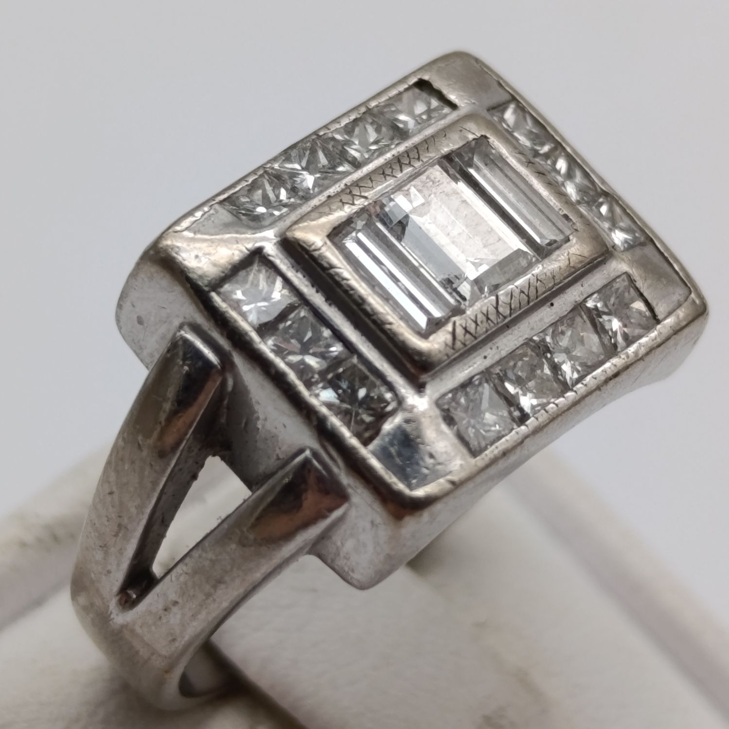 18kt Gold ring with 3 baguette diamonds and 14 side diamonds - total of 2ct - weighs 8.3g