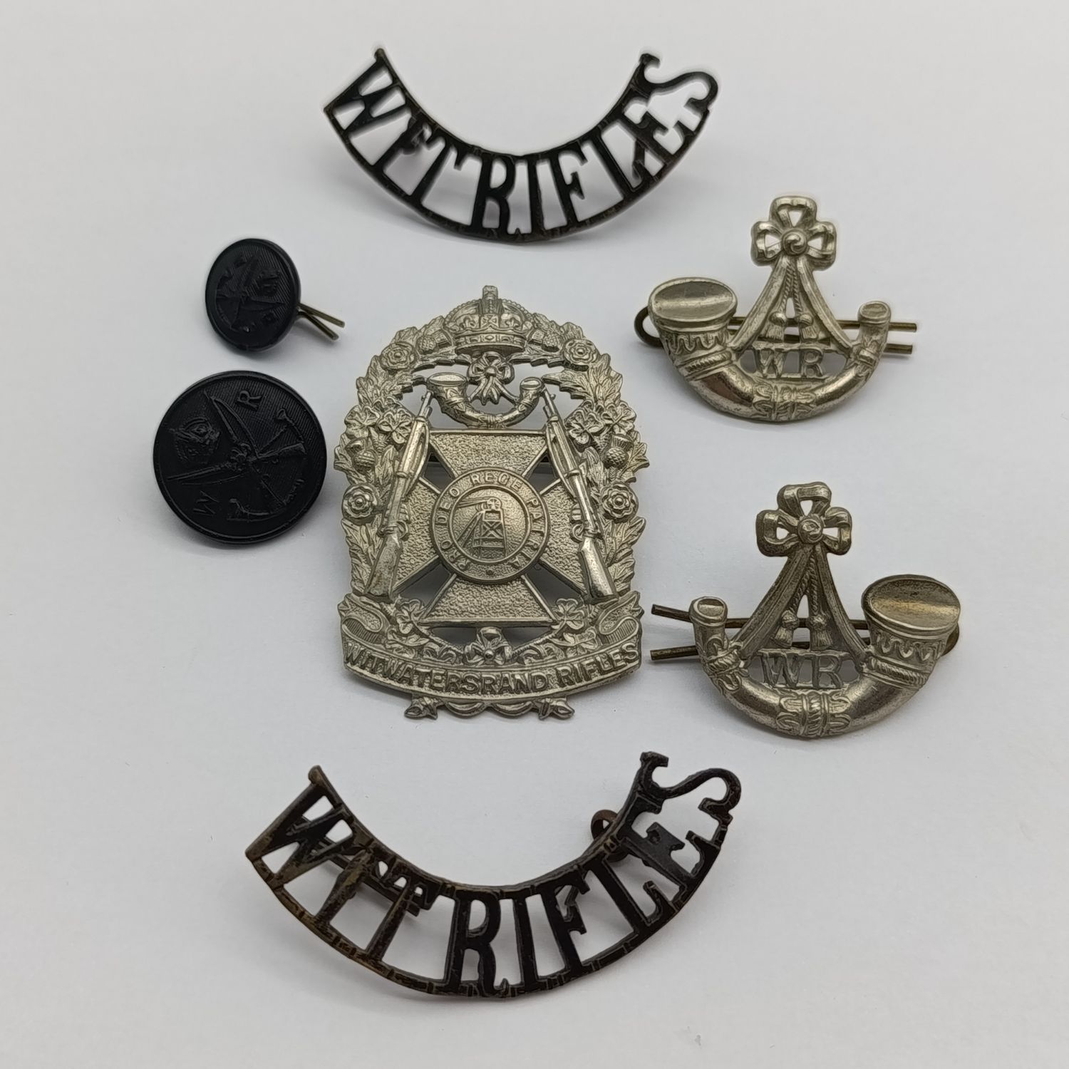Set of Witwatersrand rifles badges - cap, collars and shoulder titles