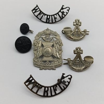 Set of Witwatersrand rifles badges - cap, collars and shoulder titles