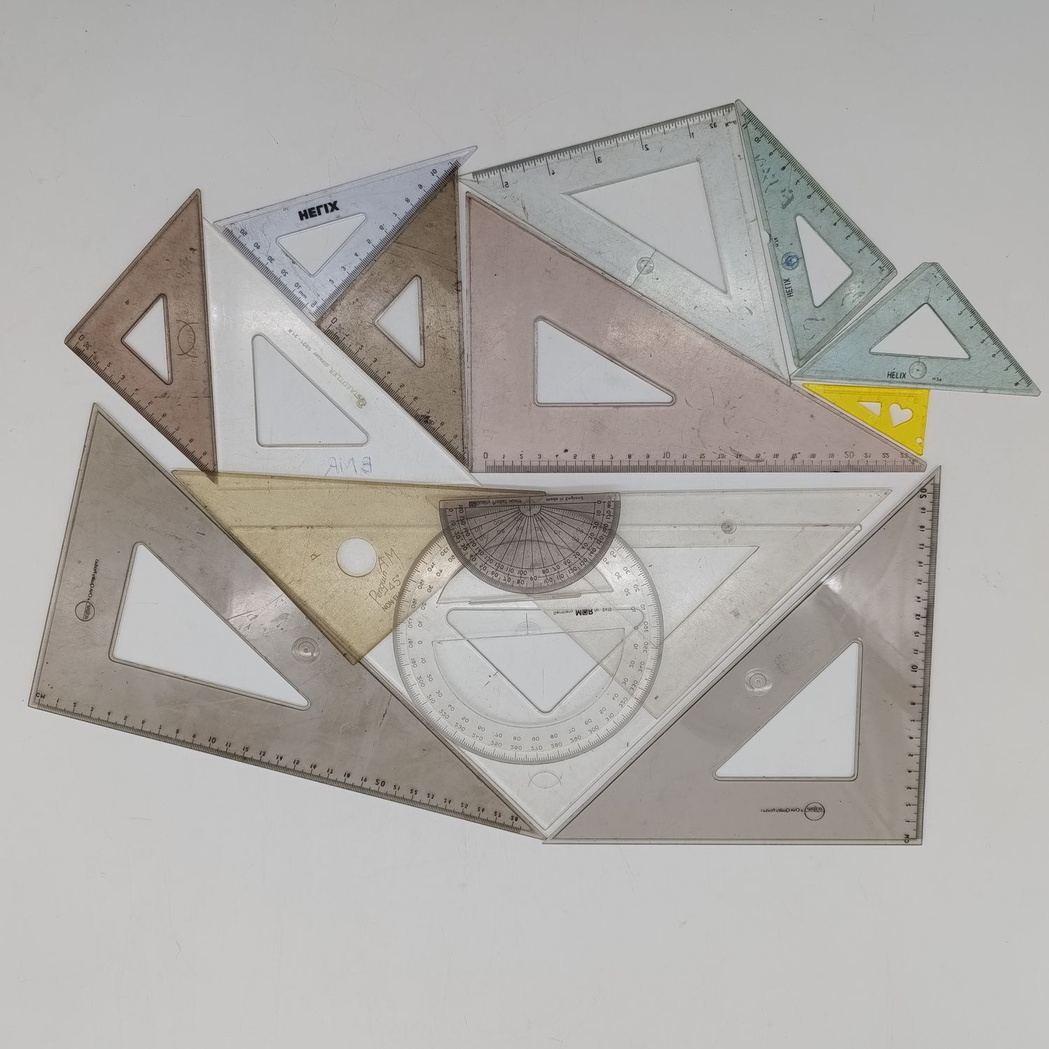 Lot of assorted technical drawing triangles and other instruments