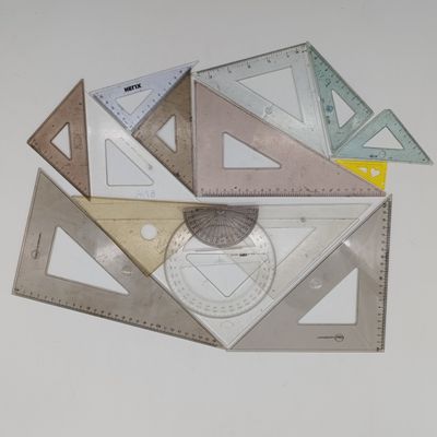 Lot of assorted technical drawing triangles and other instruments