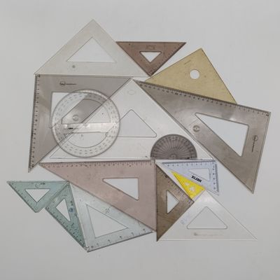 Lot of assorted technical drawing triangles and other instruments
