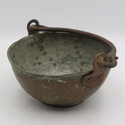 Antique copper bowl with cast iron handle