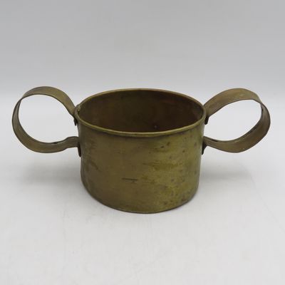 Antique brass cup with large handles
