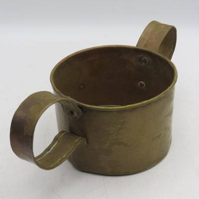 Antique brass cup with large handles