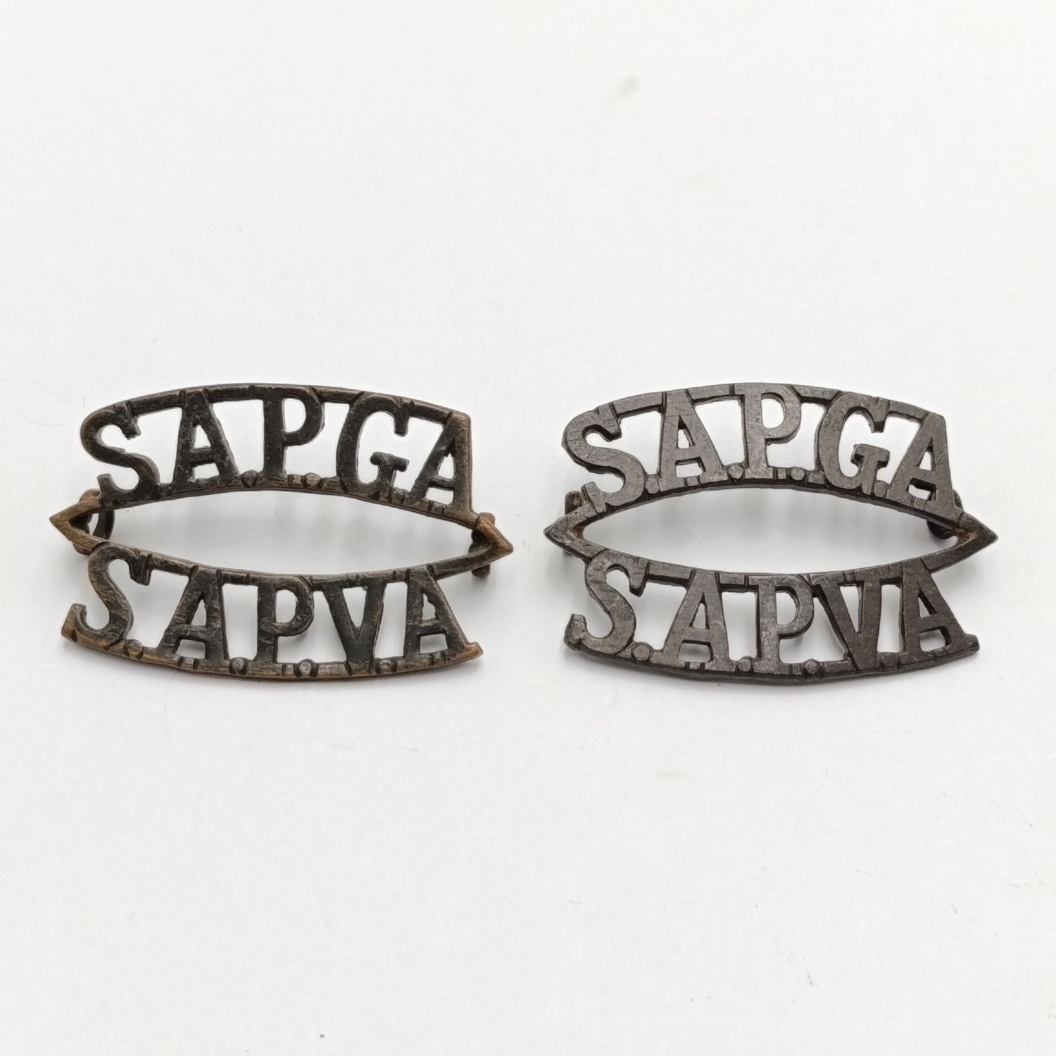 Pair of South African Permanent Garrison Artillery shoulder titles