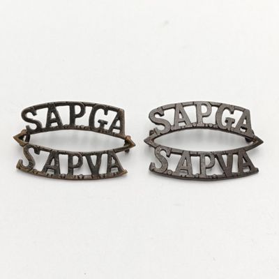 Pair of South African Permanent Garrison Artillery shoulder titles