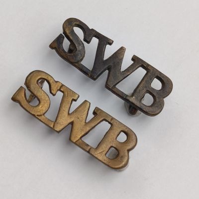 Lot of 2 South Wales Borderers shoulder titles