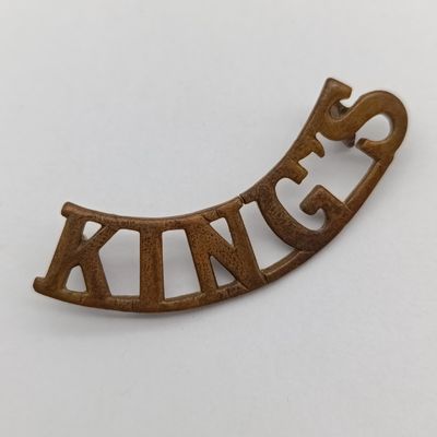 WW1 King"s Liverpool regiment brass shoulder title
