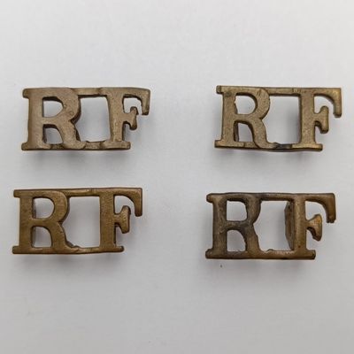 Lot of 4 British Royal Fusiliers shoulder titles