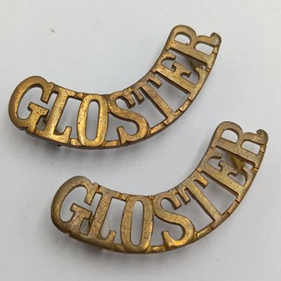 Pair of Gloucestershire regiment shoulder titles