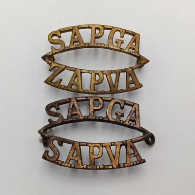 Pair of South African Permanent Garrison Artillery shoulder titles
