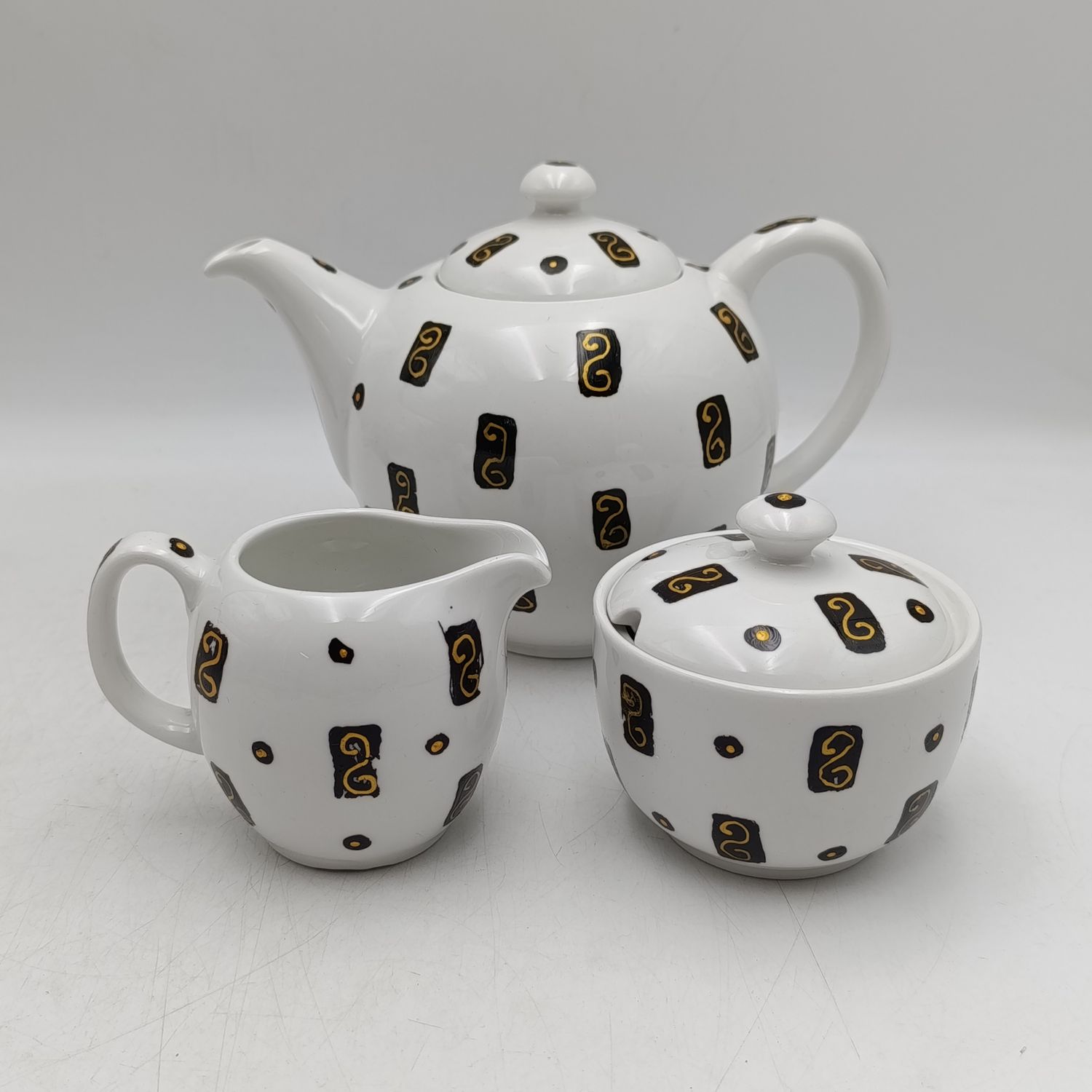 Vintage Continental teapot, milk jug and sugar bowl