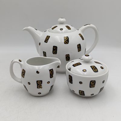 Vintage Continental teapot, milk jug and sugar bowl