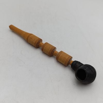 Antique African tribal terracotta smoking pipe with wooden stem