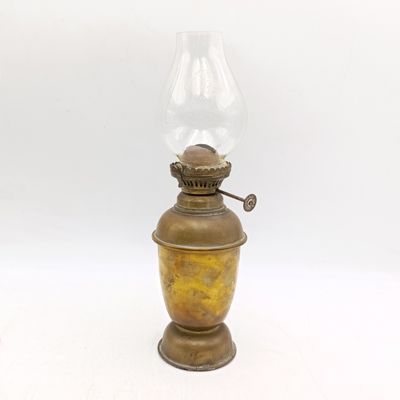 Vintage brass oil lamp with glass shade