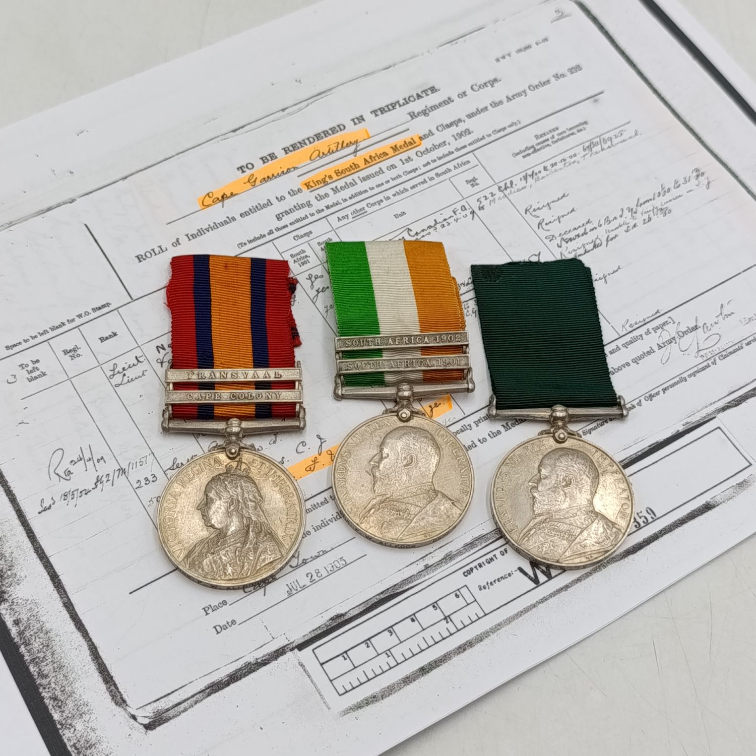 Boer War QSA and KSA with Colonial long service medal issued to 577 Gunner FW Allcock, Cape Garrison Artillery