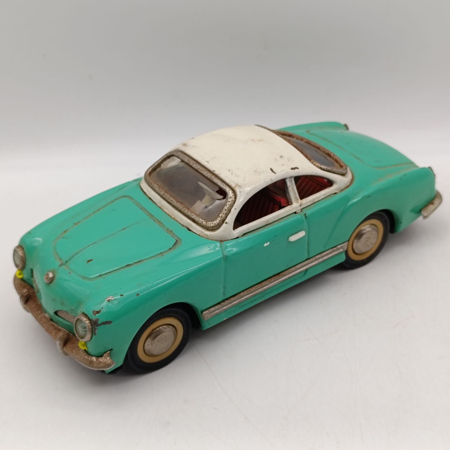 Vintage Volkswagen Karmann - Ghia tinplate friction toy car