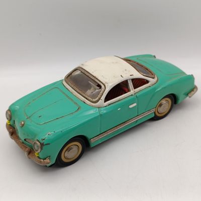 Vintage Volkswagen Karmann - Ghia tinplate friction toy car