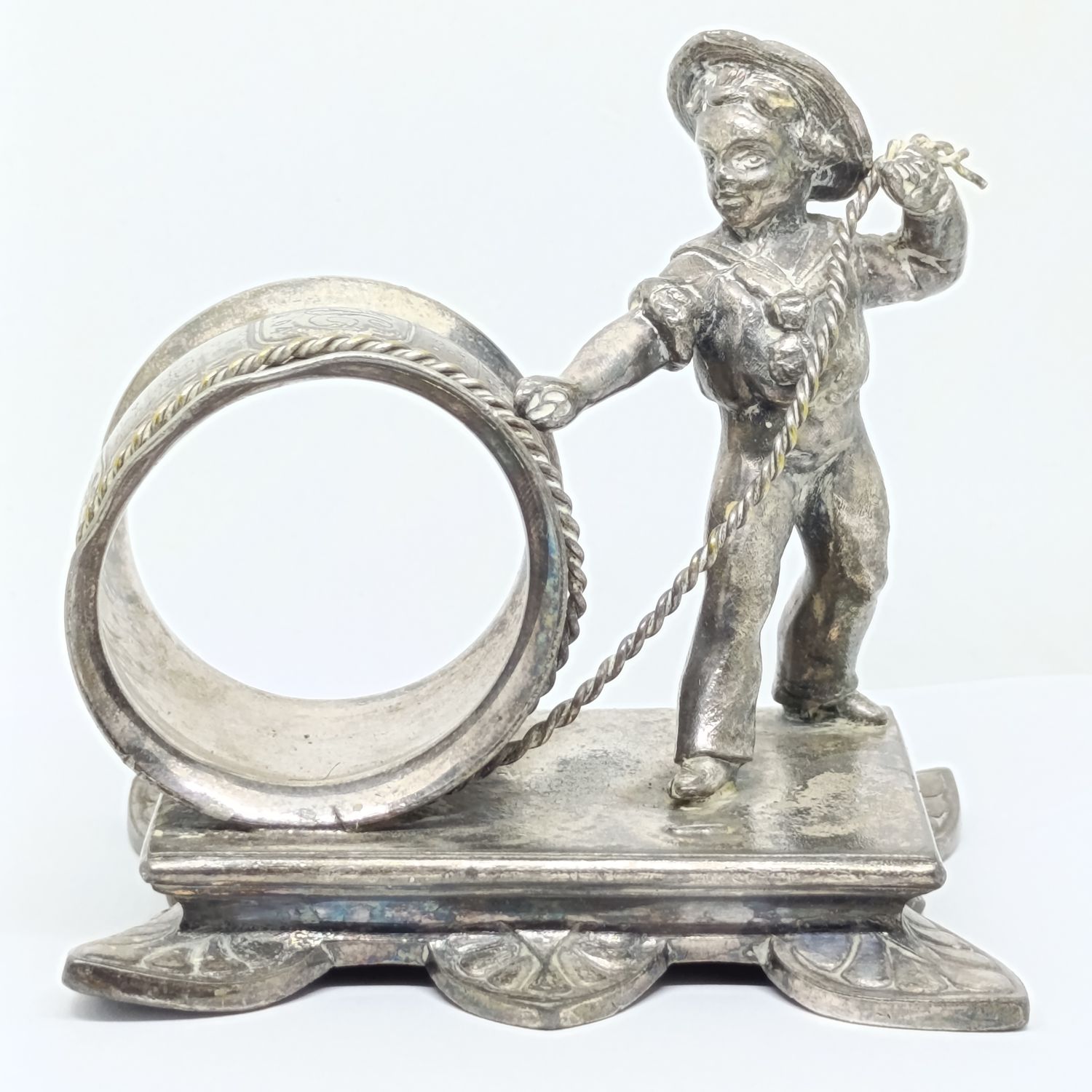 Antique Victorian Napkin ring holder of boy pulling rope