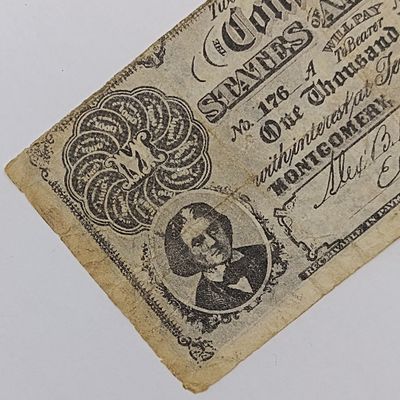 1861 Confederate States of America $1000 note . Issued in Montgamery, Alabama - well used - torn at bottom - #176