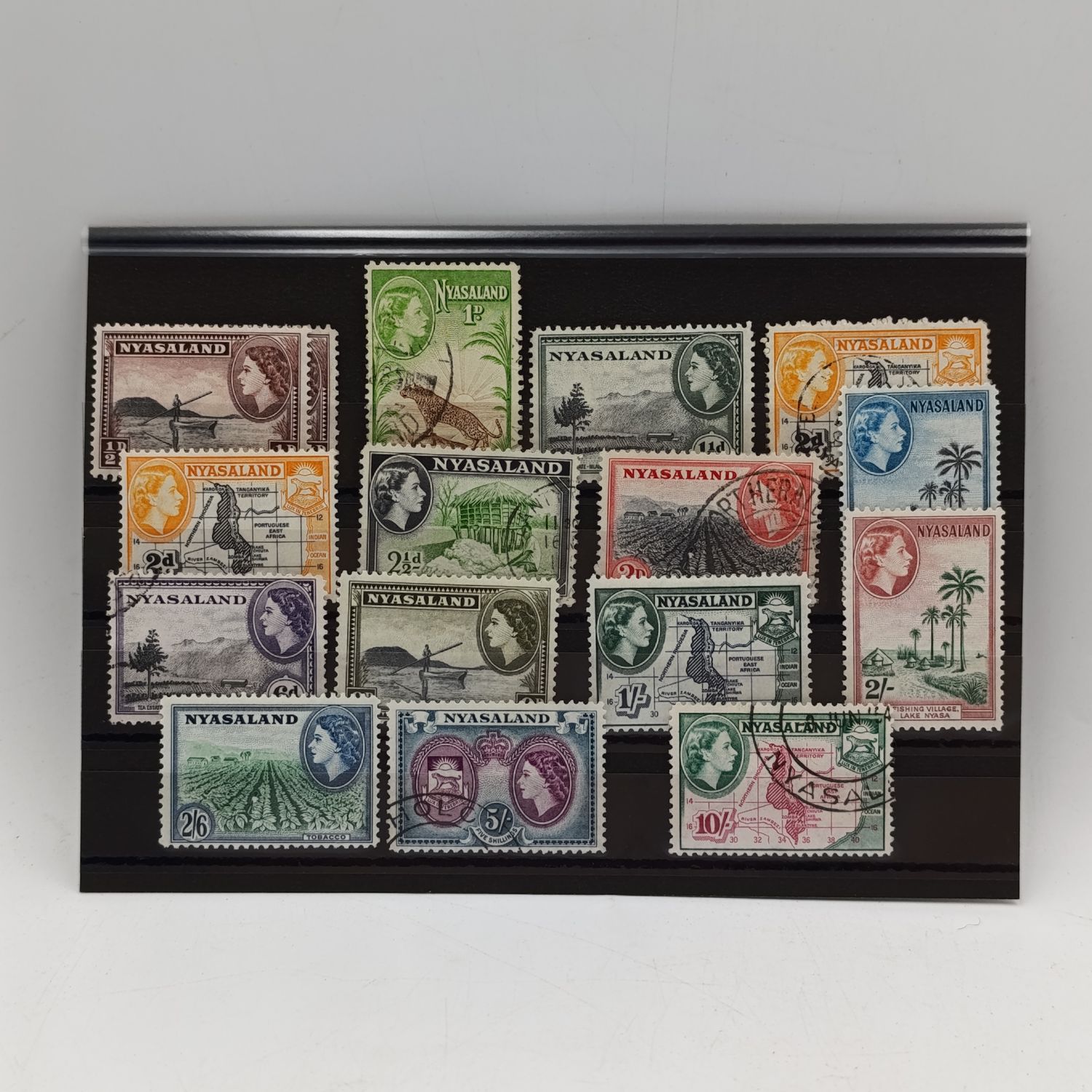 Nyasaland QEZ set to 10 Shilling - used (some mint) on card