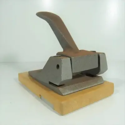 Vintage cast iron paper punch - 2 holes
