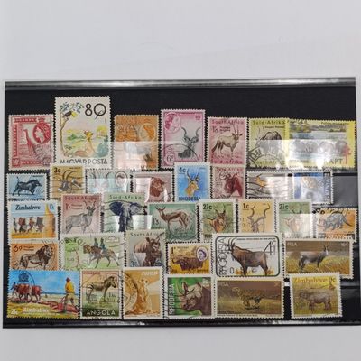 Lot of 35 animal stamps on card-unresearched