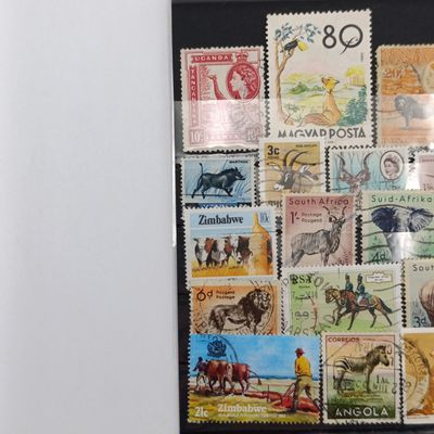 Lot of 35 animal stamps on card-unresearched