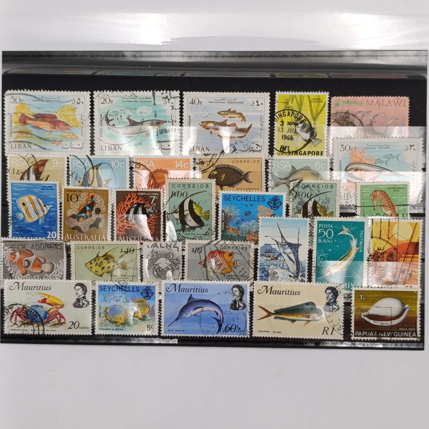 Card with 30 Fishing and sea life Stamps - unresearched