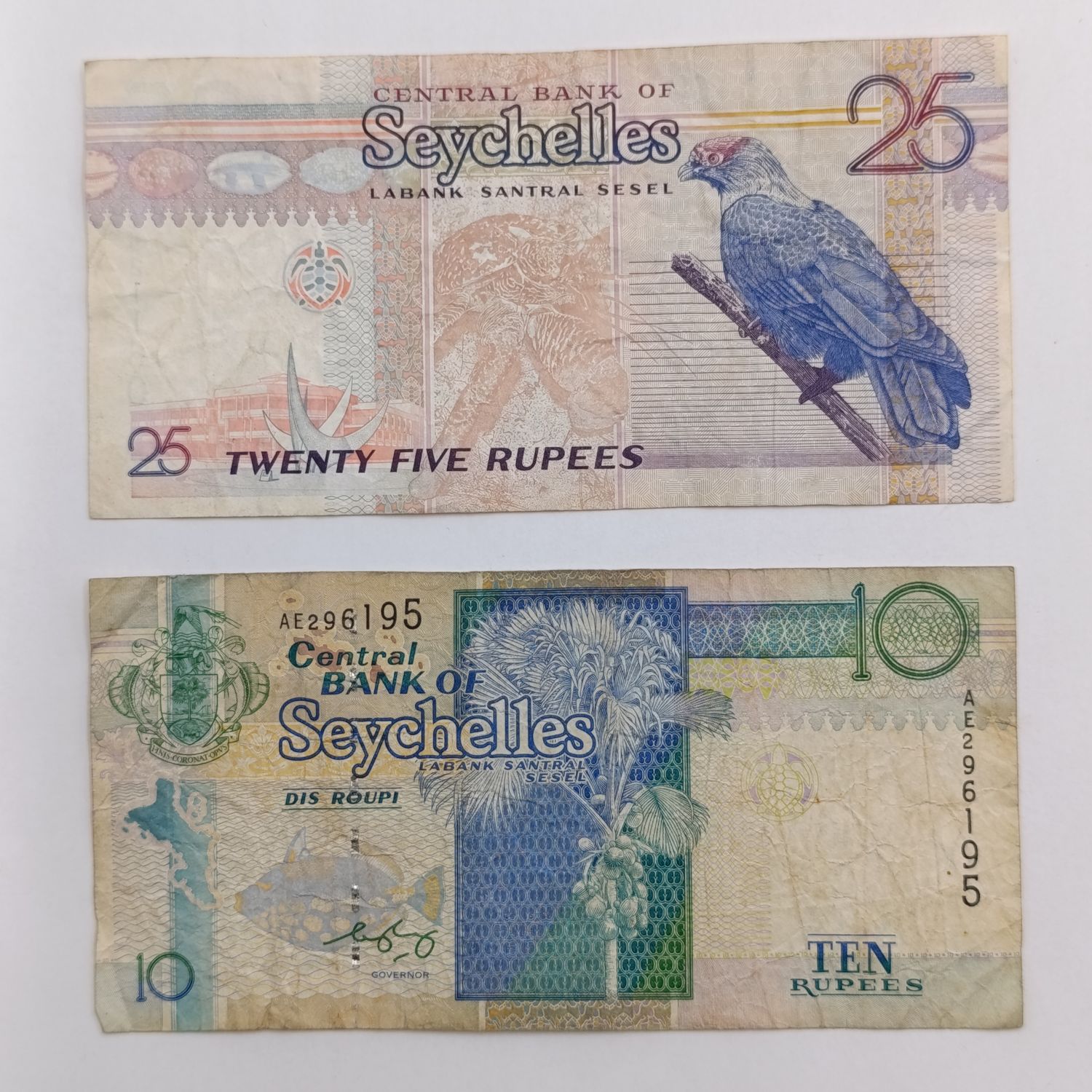 Seychelles Ten Rupees and 25 Rupees vintage banknotes
