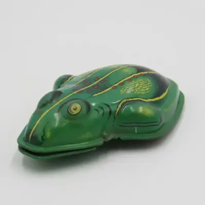MM269 Tin plate clicker toy frog