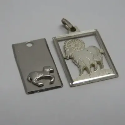 Pair of Aries Zodiac pendants - Both silver