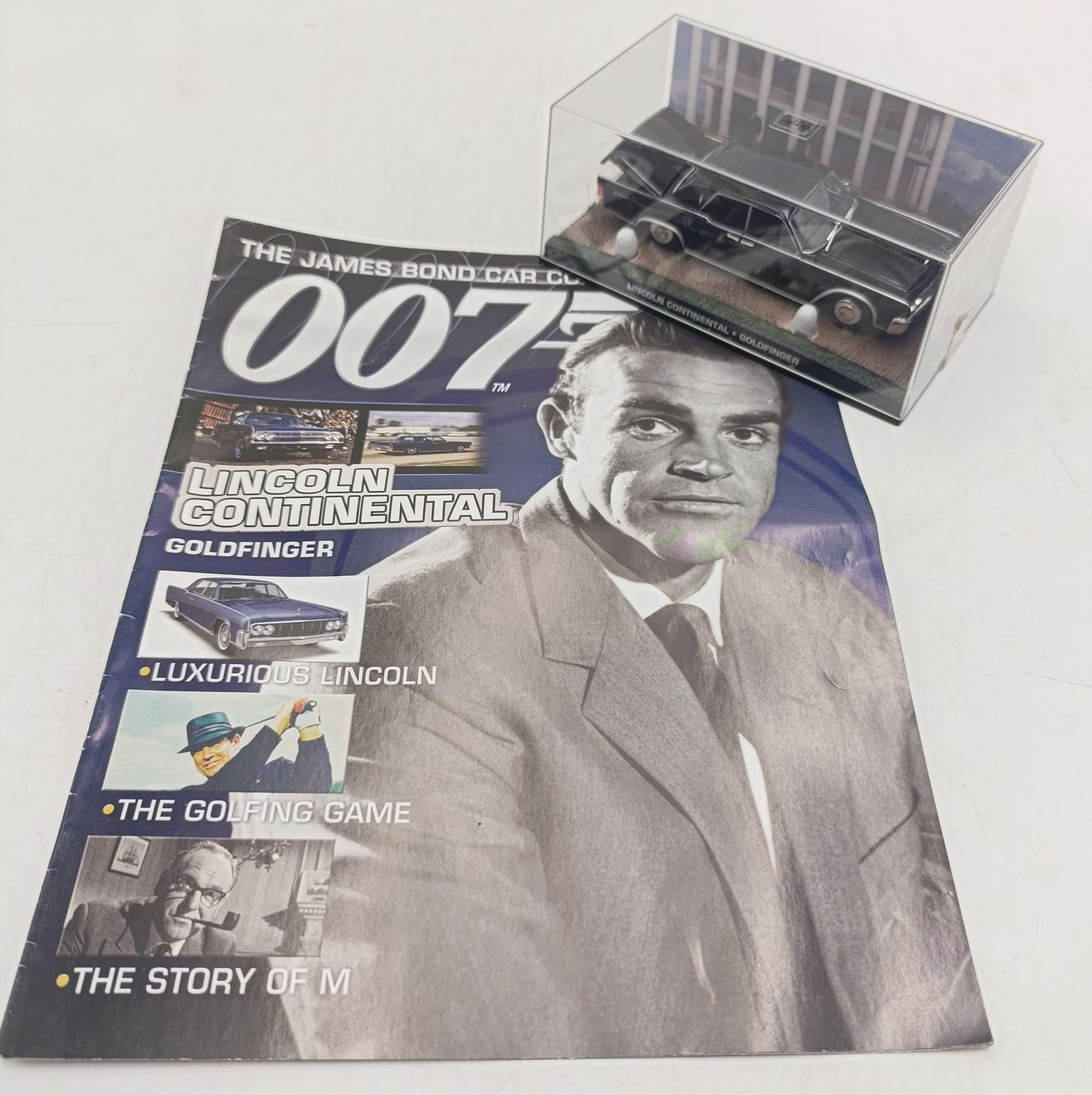 James Bond 007 Lincoln Continental model car with booklet - Goldfinger