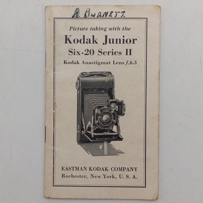 Vintage Kodak Junior Six - 20 Series II folding camera in box with booklet