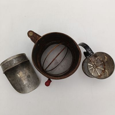 Pair of vintage flour sieves and scoop