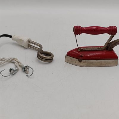 Vintage travelling sad iron and element for cooking water