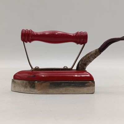 Vintage travelling sad iron and element for cooking water