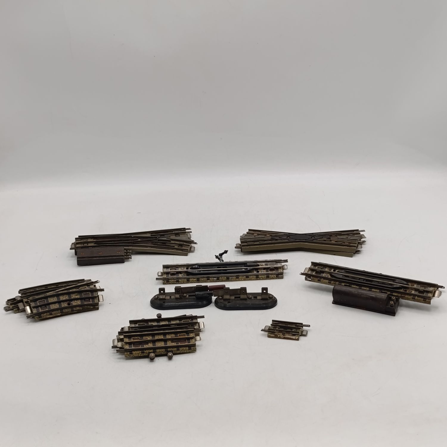 Lot of 18 Meccano Hornby Dublo assorted tracks and 2 flip - over switches
