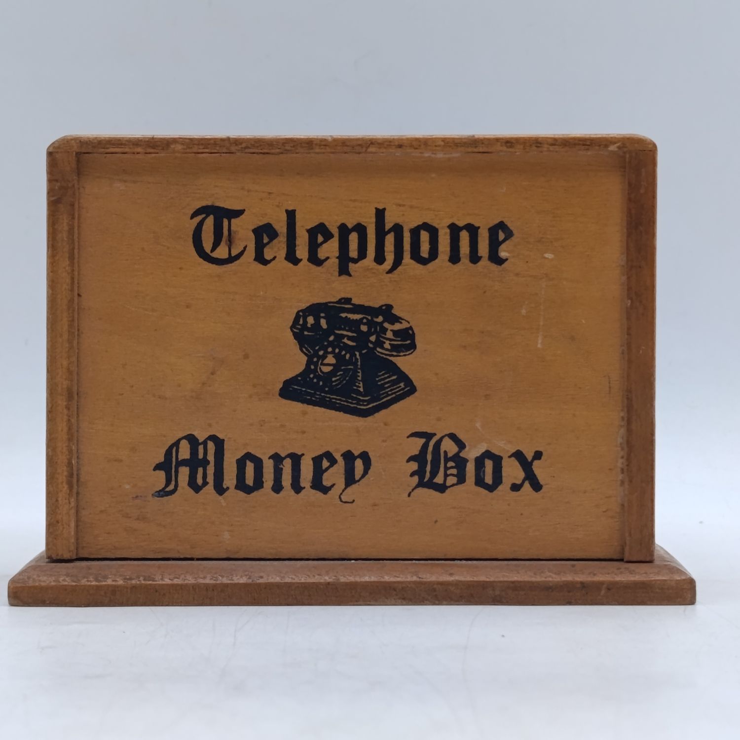 Vintage wooden telephone money box