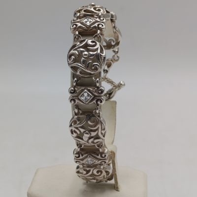 Sterling silver bracelet with 5 clear stones - weights 23,4g - length 20cm