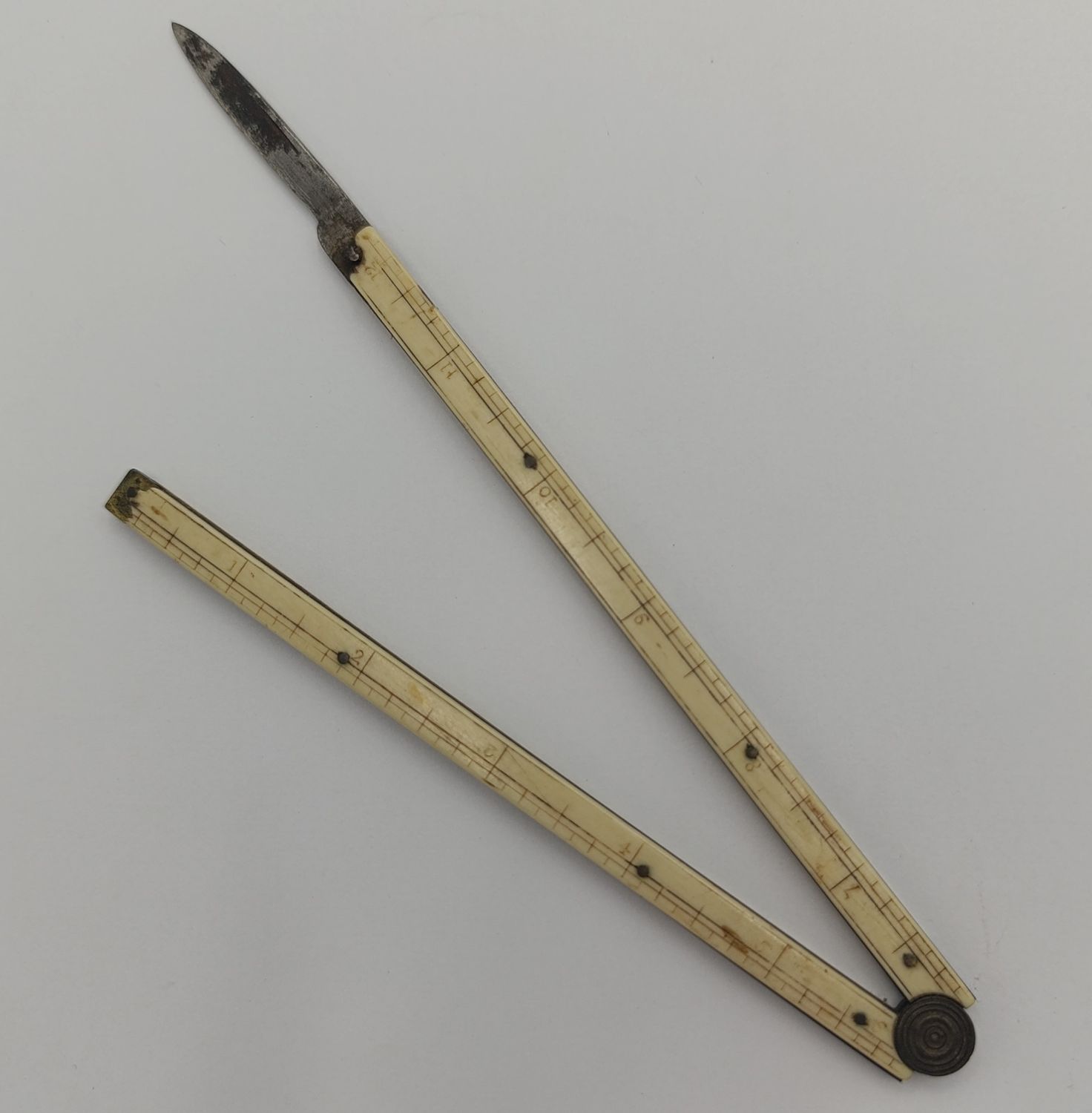 Antique folding ruler with blade - bone/ivorene handles some damage
