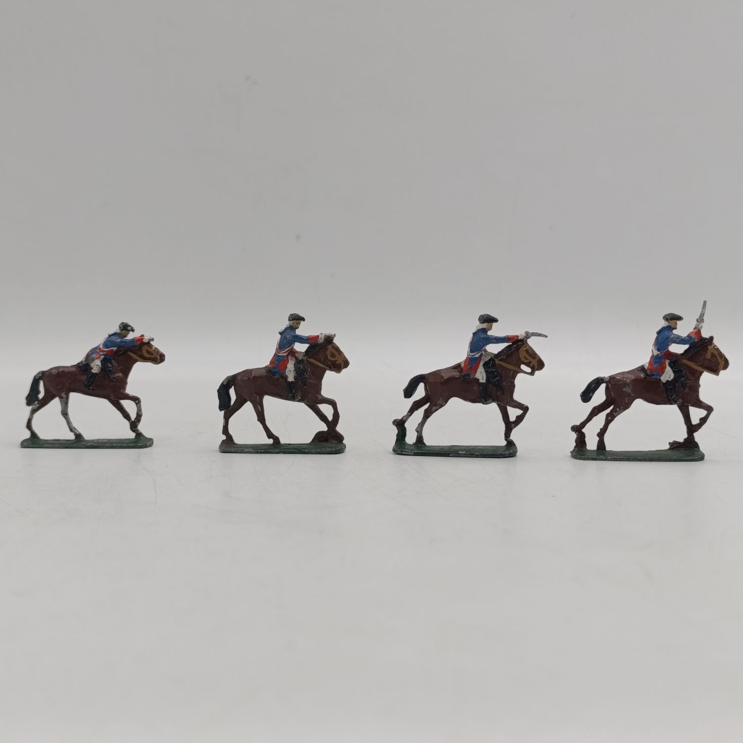 Lot of 4 vintage cavalry lead soldiers