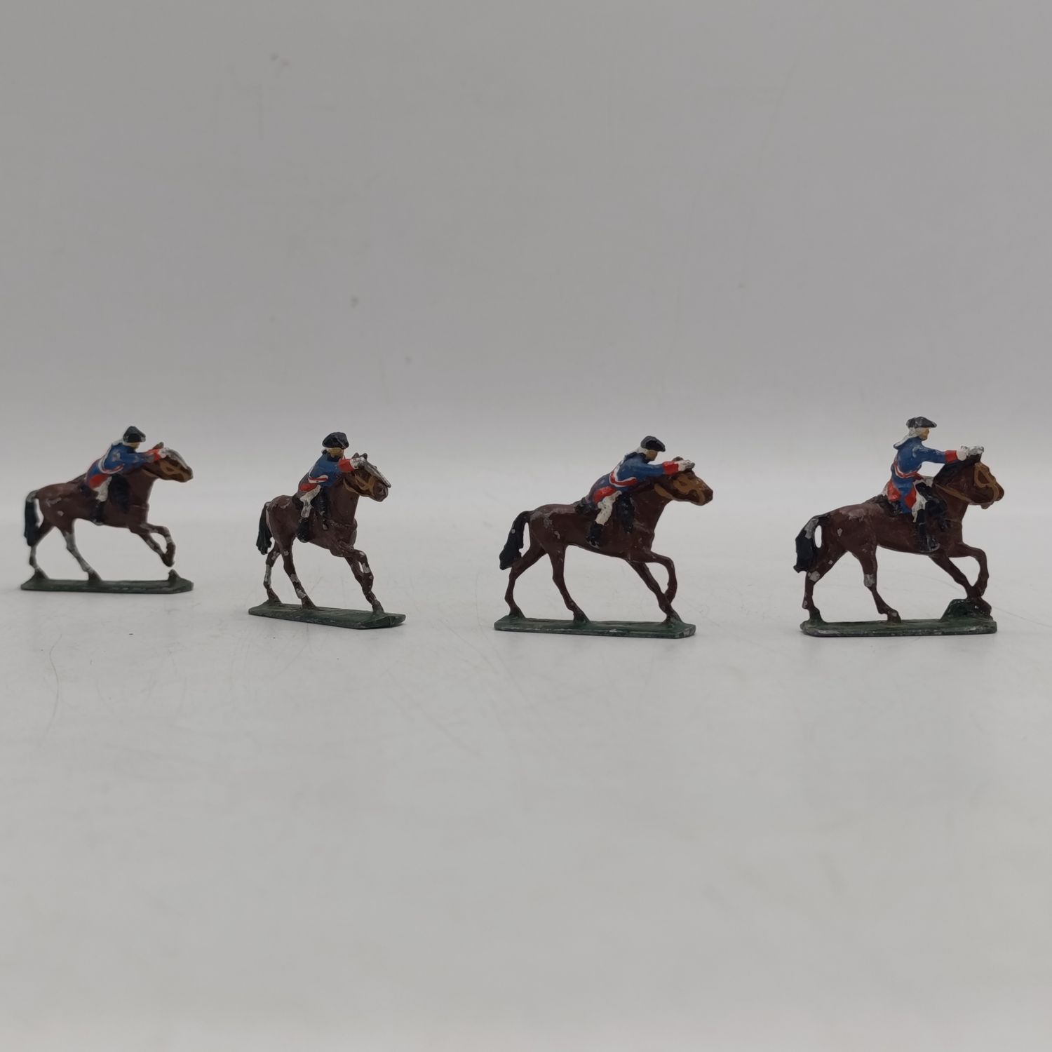 Lot of 4 vintage cavalry lead soldiers