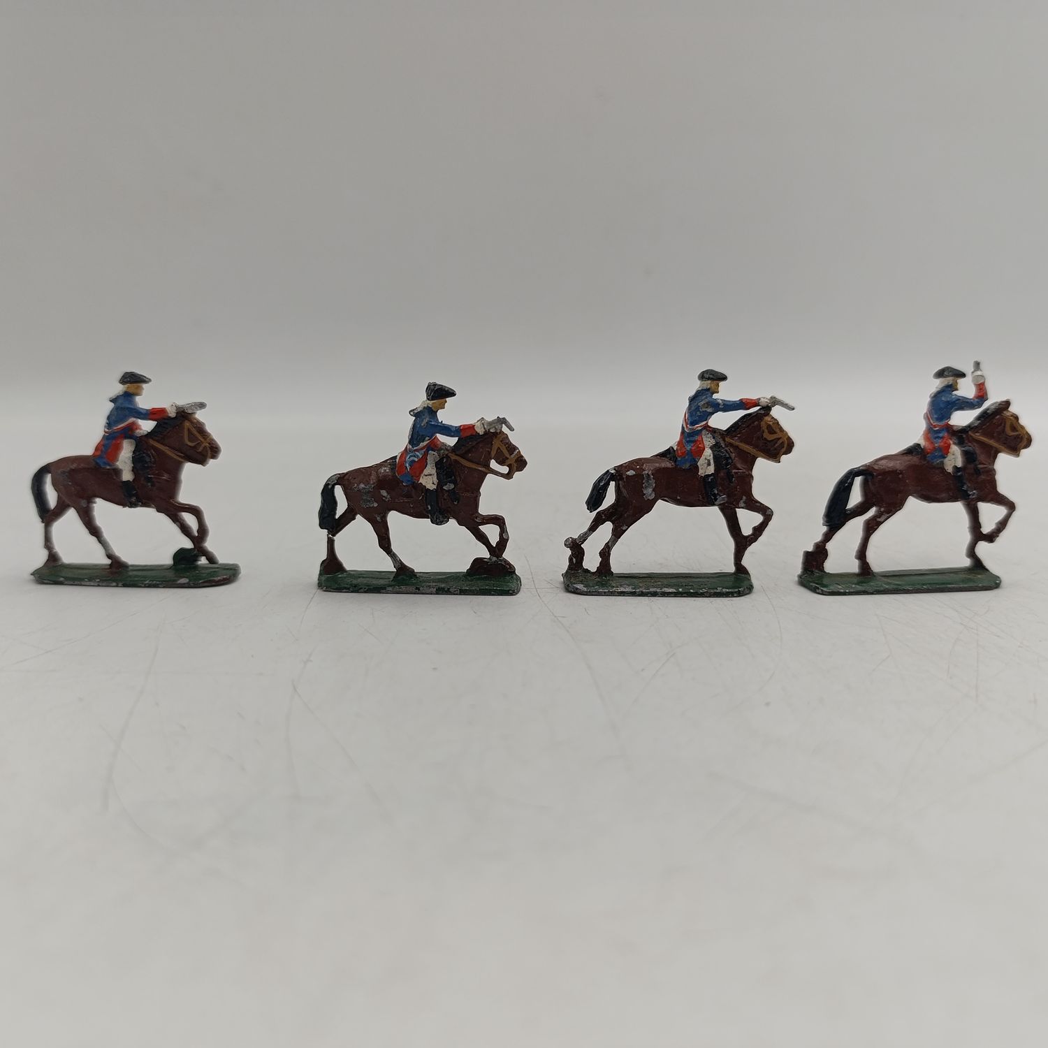 Lot of 4 vintage cavalry lead soldiers