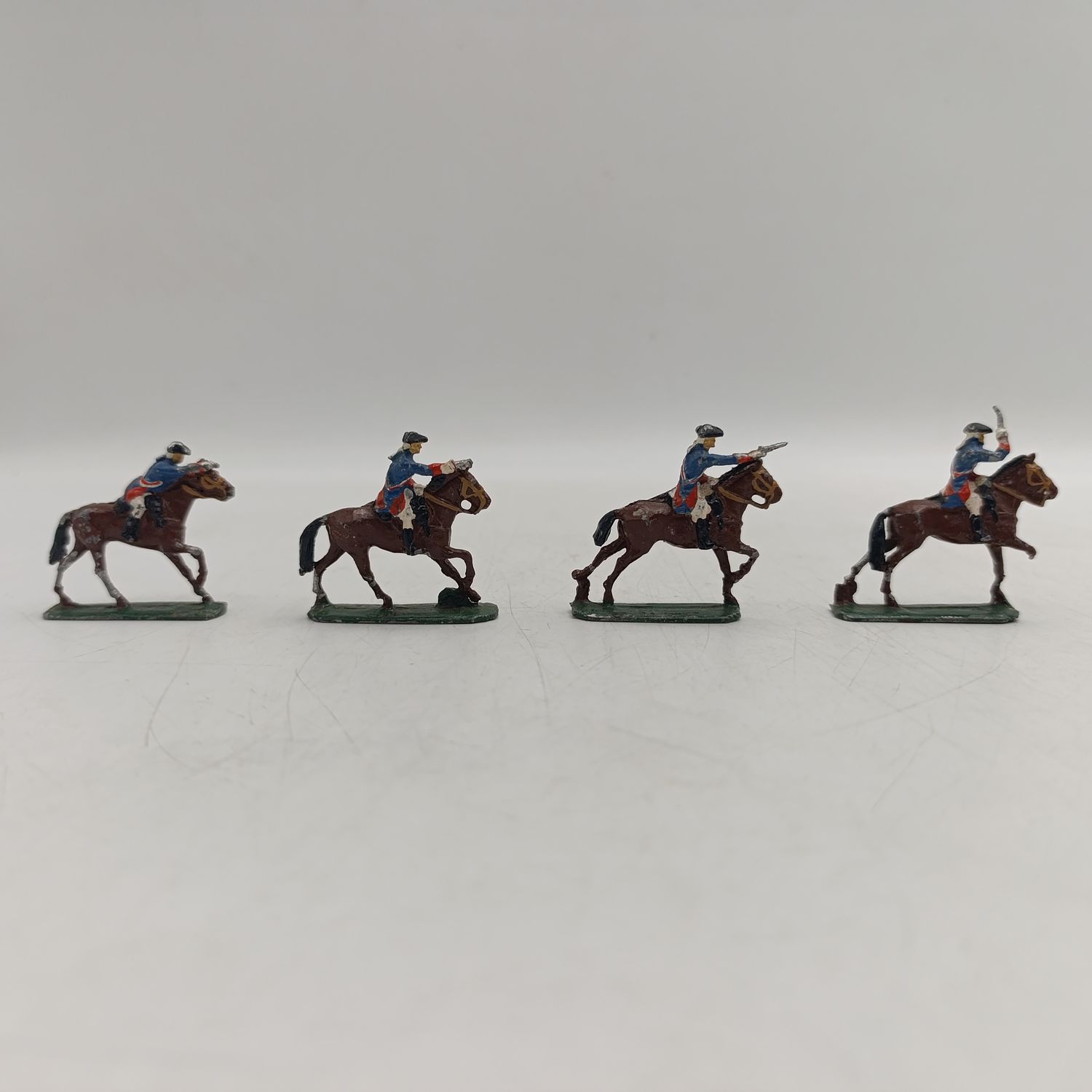 Lot of 4 vintage cavalry lead soldiers